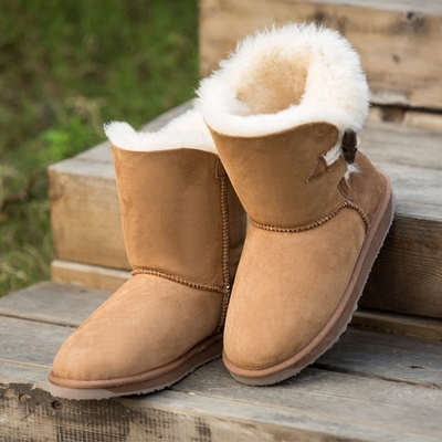 2015新款冬季雪地靴女中筒羊皮毛一体真皮防滑保暖棉鞋纽扣女靴子