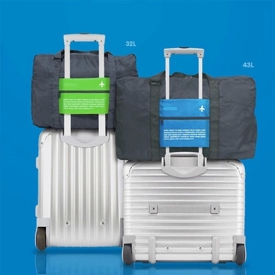 旅行袋手提大容量行李袋女短途单肩拉杆折叠包轻便韩版行李包袋男