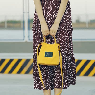 2017韩版新款马卡龙色单肩手提斜跨帆布包便当包水桶包清新小包包